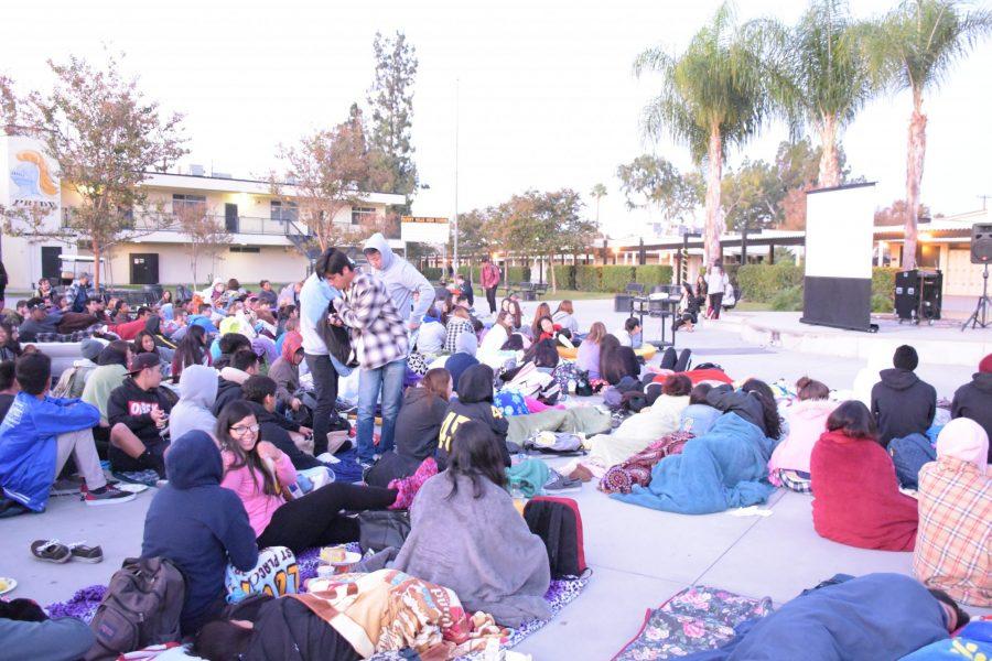 The Class of 2016 seniors gather in the quad early in the morning to watch a movie. Back then before the jumbotron in the squad, the ASB had to set up a screen in front of the steps of the quad for the movie to be projected there for students to watch. (Accolade File Photo)