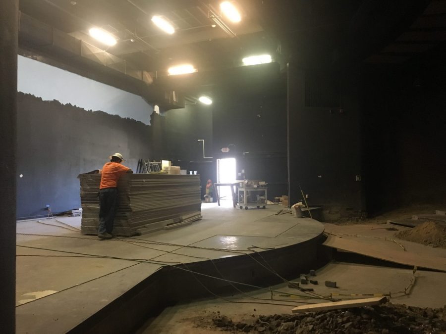 A worker continues construction on the first day of school inside the closed Performing Arts Center. He was working on a part of the stage during a tour that principal Allen Whitten gave to two Accolade staff members. Photo by Accolade news editor Tyler Pak.