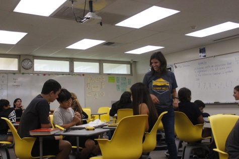 New Algebra I and Algebra Foundations 1 teacher Lauren Johnson moves around the classroom asking students if they are in need of assistance in Aug. 16. Photo taken by Accolade photographer Brianna Zafra.