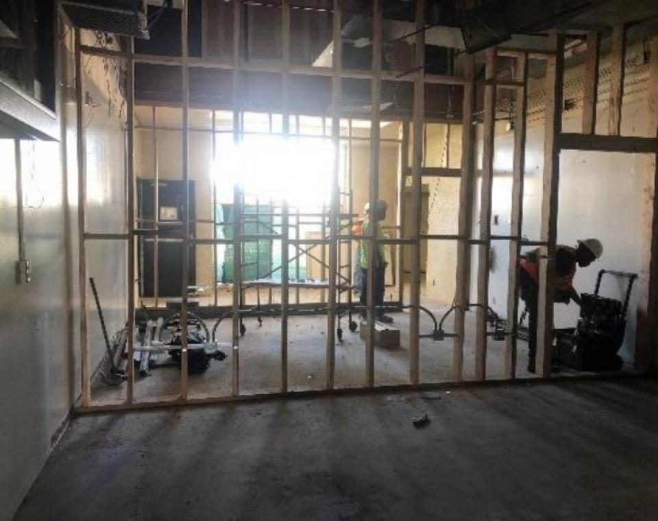 PAC renovation – Construction workers focusing on music teacher Whitney Ting’s office in the PAC