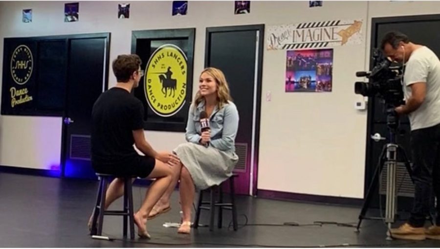 Dance Production team member sophomore David Burn (left) sits down for his first professional media interview Sept. 3 with Fox 11s Megan Colarossi, co-host of Good Morning LA. As the only male performer on Sunny Hills Dance Production, Burn will be featured in Colarossis School Standouts segment on Friday, Sept. 19. Image posted with permission from Leiana Volen.