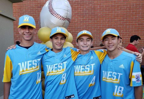 Freshmen Jack Bender, Bohdan Faulkner, Dustin Staggs and Russell Yang (from left to right) pose for a picture at their victory parade in Downtown Fullerton Aug. 22. Photo used with permission from Mason Morris.