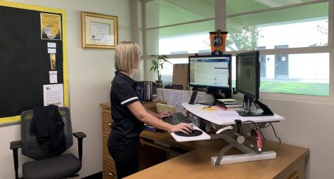 New assistant principal Melissa Stinson works in her office dealing with tasks given to her at her new position. Photo taken by Paul Yasutake.