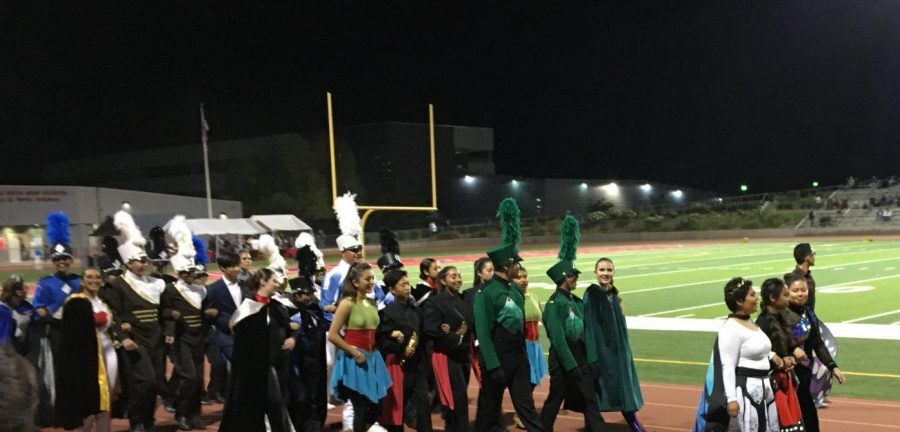 Band leaders from each school in the competition march on the field before receiving their awards at Sierra Vista High School Oct. 26. Sunny Hills is the third team from the right. Image reprinted with permission from Brian Milian