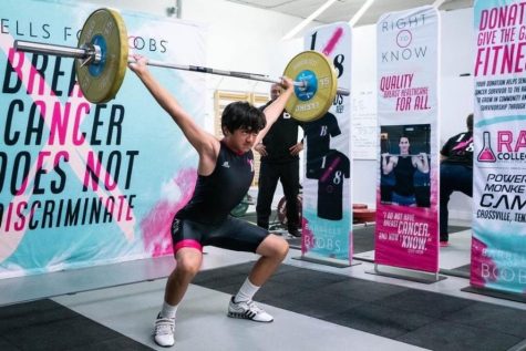Freshman Julian Malone performs a 50 kilogram lift during a control test at the Academy of Weightlifting in Santa Ana earlier this year in February. Reposted with permission from Monica Malone.