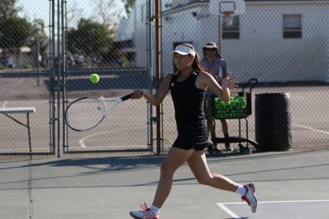 No. 1 doubles player sophomore Natalija Glavy hits a running forehand during Sunny Hills' Oct. 22 home match against Fullerton Union High School. Photo taken by Accolade photographer Paul Yasutake