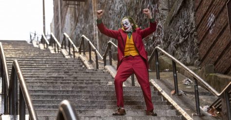 After officially rebranding his identity from Arthur Fleck to the Joker, actor Joaquin Phoenix celebrates as he makes his way to the Murray Franklin TV show recording. Image used with permission from Warner Bros.