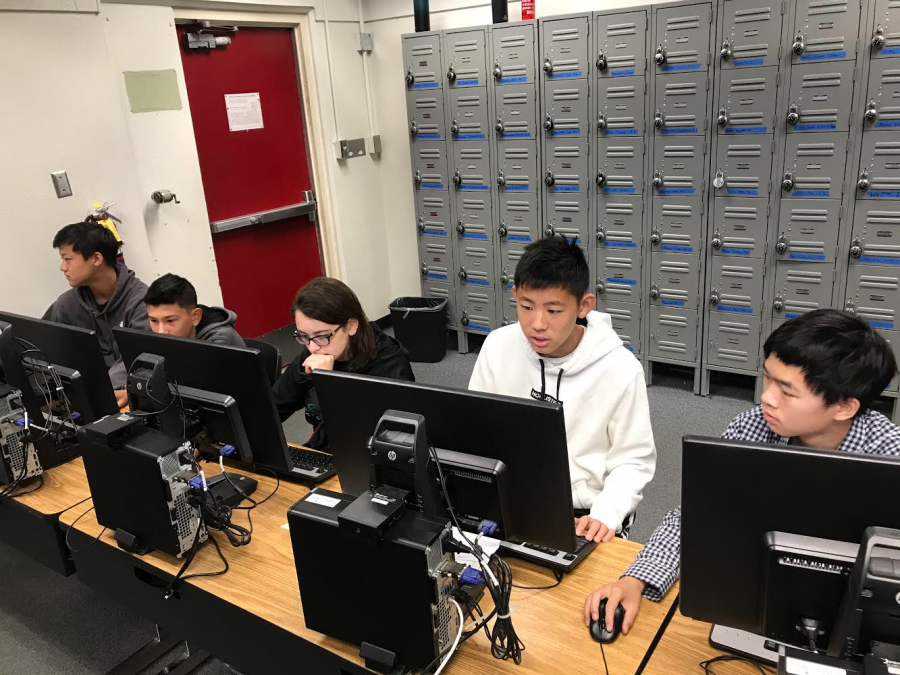 The Sunny Hills Cyber Patriots club competes in its first tournament Oct. 26 at Troy High School. The club is the only one this school year formed by a freshman, Remy Garcia-Kakebeen (third from left). Image used with permission from Minhoh Han.