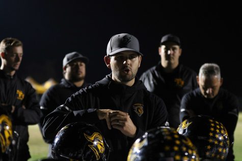 Head Coach Peter Karavedas speaks to the football team following the teams 42-21 loss to Bakersfield Christian in the CIF State Division 3-A SoCal Regional game at Bakersfield Christian High School stadium Dec. 14. Photo taken by Accolade photographer Paul Yasutake