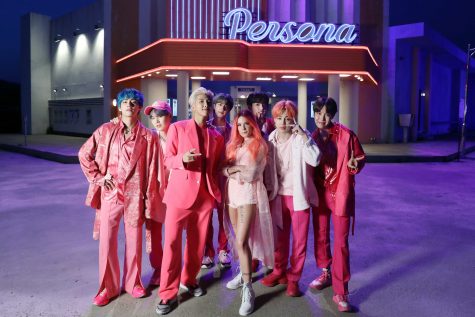 BEHIND THE SCENES: Seven-member boy band BTS stands next to singer Halsey on their set for the music video for “Boy With Luv,” the lead single from the 2019 album Map of the Soul: Persona. Image reprinted with permission from Taesong Kim/image.net.