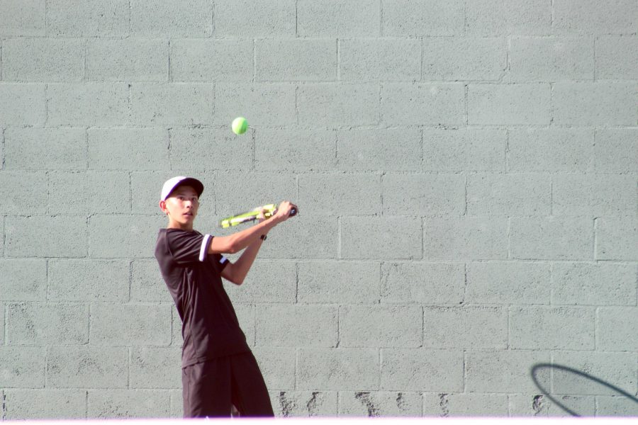 Boys+tennis+singles+player+freshman+Owen+Taylor+prepares+to+hit+a+backhand+during+a+March+3+match+against+Whitney.+Taylor+aims+to+play+in+the+April+21-26+Ojai+Tournament%2C+but+concern+over+how+to+stop+the+spread+of+the+coronavirus+has+the+events+status+in+jeopardy.+Image+taken+by+Accolade+photographer+Brianna+Zafra.