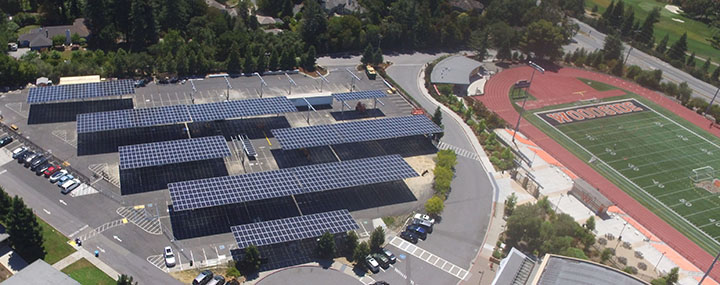 The Fullerton Joint Union High School District has contracted with San Diego-based Borrego Solar Systems Inc. to install solar shade structures like those pictured above in various parking lots at each of the districts school sites. The solar panel-roofed carports will be built on the Sunny Hills High School parking lot near the Performing Arts Center by the middle of 2021. Image posted with permission from Borrego Solar.