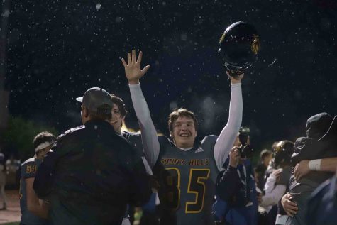 Tight end and defensive lineman sophomore Ethan Johnson (center) celebrates following the team's championship game victory over Santa Barbara at San Marcos High School Stadium on Nov. 30. After the spring sports cancellation, football may not have its chance to defend the fourth CIF-Southern Section title in school history. Photo taken by Accolade photographer Paul Yasutake
