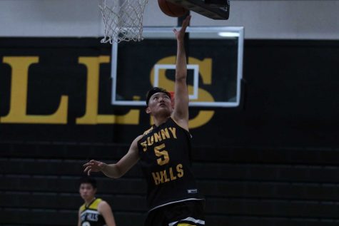 Senior Peter Park performs a layup during a practice on November 14. Park is one of the 12 valedictorians in the Class of 2020. Photo taken by Accolade photographer Paul Yasutake