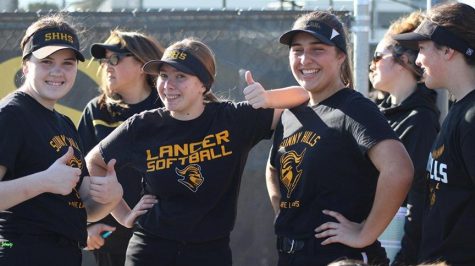 Sophomore Grace Johnson (center) shares a moment with some of her teammates after one of their last practices on Feb. 12.