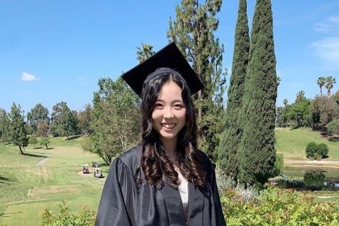 Senior Jenny Lee smiles for a picture in her neighborhood after filming a video for Sunny Hills High School's virtual graduation. Image posted with permission from Jenny Lee.