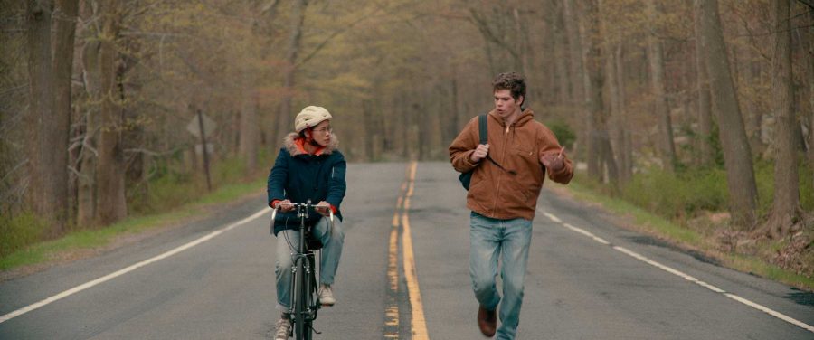 In the new coming of age movie The Half of It, Peter stops Ellie on her bike ride home to propose an agreement on his love letter to Aster. Image posted with permission from Netflix. 