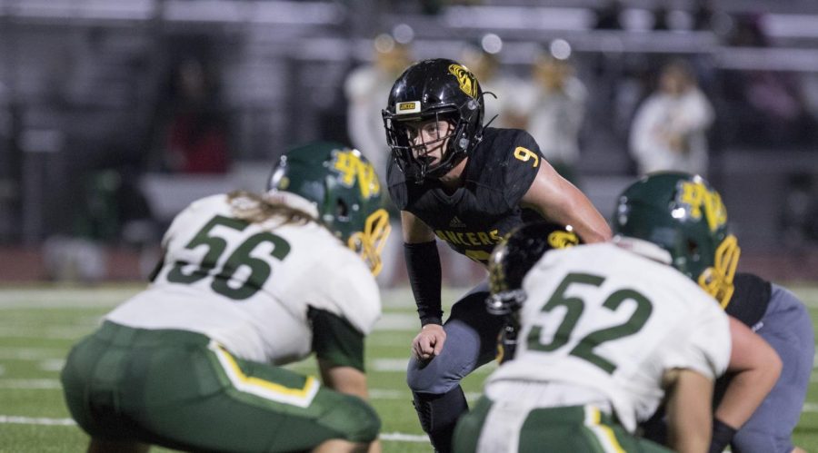 Wearing his No. 9 Lancer football jersey, linebacker and then-junior Carson Irons gets ready for the next offensive series during a Nov. 15, 2019, game against Notre Dame of Riverside in a California Interscholastic Federation-Southern Section Division 8 quarterfinals matchup. After racking up 186 tackles, two sacks and an interception last season, Irons has committed to play Division 1 football for Princeton University in New Jersey.