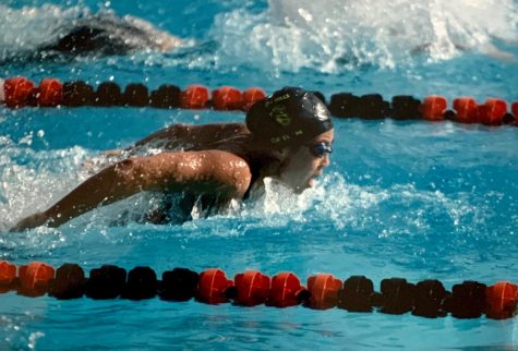 Then-sophomore Katie Cho swims toward the finish line in the 2019 Division 3 California Interscholastic Federation [CIF] finals for the women’s 100-yard Butterfly held at Riverside City college in Riverside. Cho set three Sunny Hills records for the varsity swim team.