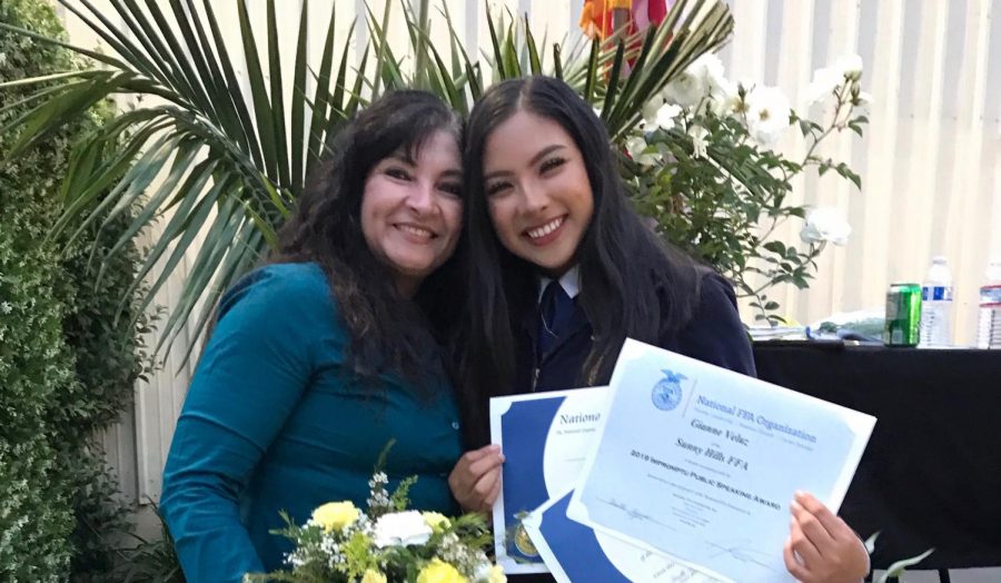 Alma Garcia (left) celebrates her daughter senior Gianne Veluz’s election to chapter office at the FFA banquet on May 9, 2019. Veluz helped Garcia recover from the coronavirus in early July.