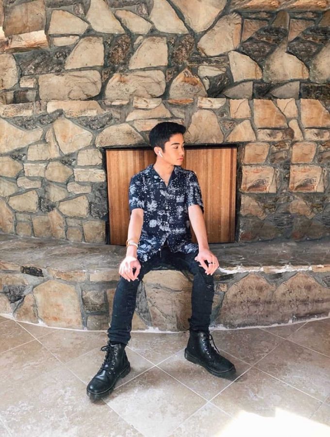 +Sophomore+Gabriel+Villanueva+sports+a+favorite+outfit+consisting+of+a+button-up+shirt%2C+black+skinny+jeans%2C+a+pair+of+Doc+Martens+and+accessories+like+rings+and+a+chain+belt.+Though+he+hasn%E2%80%99t+had+the+chance+to+wear+this+outfit+to+school+because+of+the+coronavirus+pandemic%2C+he+has+worn+similar+ones+to+Sunny+Hills+pre-COVID-19.