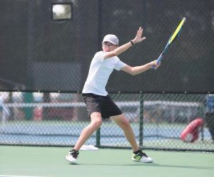 Sophomore Carson Lee hits a forehand in the 64 consolation round at the USTA Boys’ 14 and Boys 12’ National Championships in June of 2018.