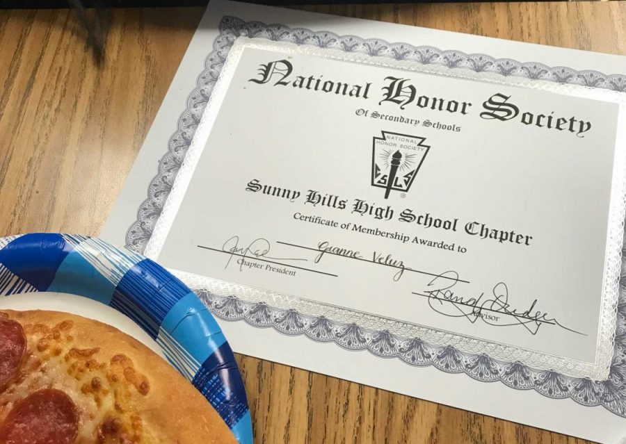 During the last official National Honors Society induction ceremony in the 2018-2019 school year, new members were invited to celebrate during a lunchtime gathering, where they were fed pizza and were given an NHS certificate.
