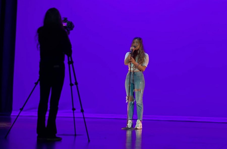 Senior Charis Lee sings Paper Hearts by Tori Kelly during the April 10 video recording session for the district-wide talent show at the La Habra High Schools Performing Arts Theater. Lees performance will go up against others from throughout the Fullerton Join Union High School District when its broadcast on YouTube Live Friday, April 23.