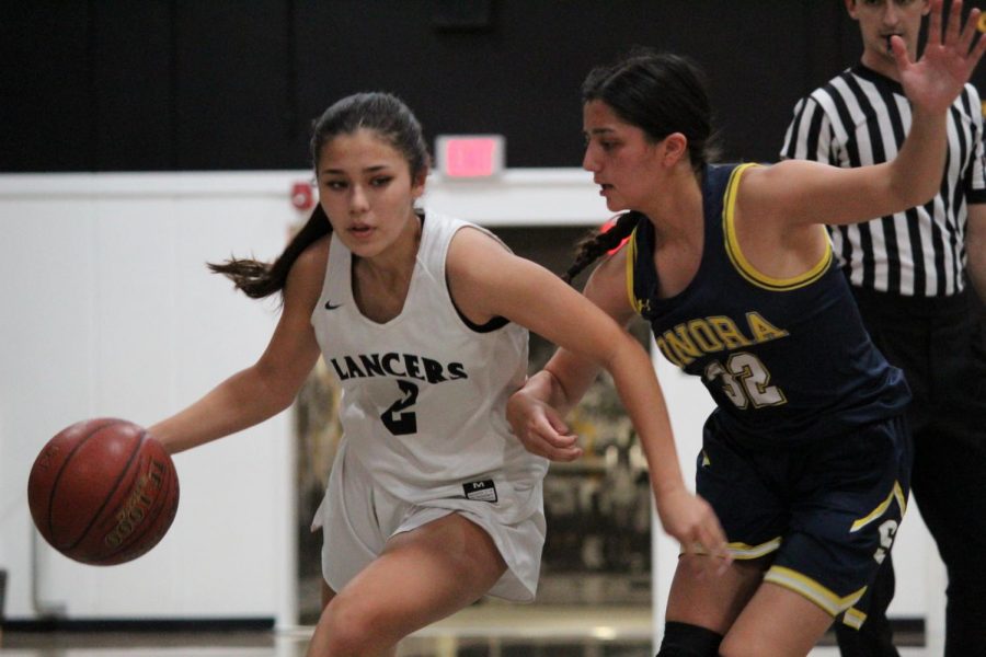 Guard freshman Taylor Parra drives toward the basket during Wednesdays home game against Sonora. Parra scored six points total.
