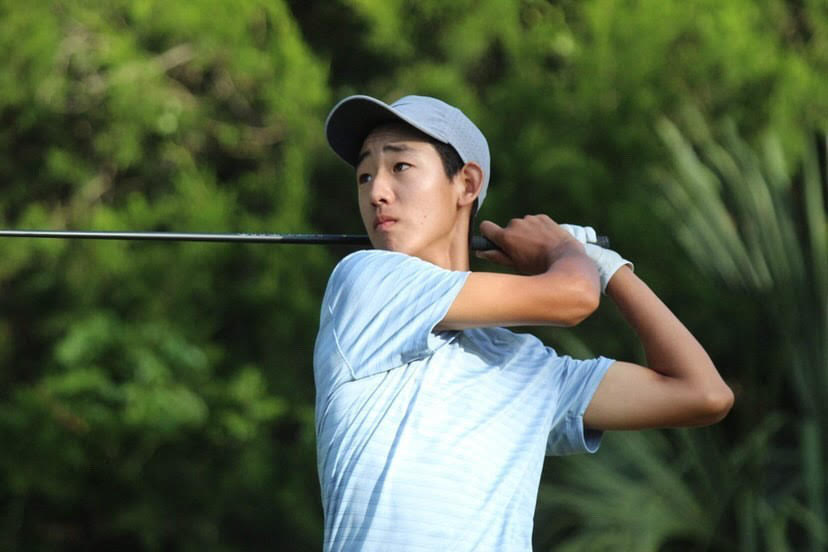 Junior Carson Kim keeps track of his shot during the 2020 Junior Players Championships in Florida.