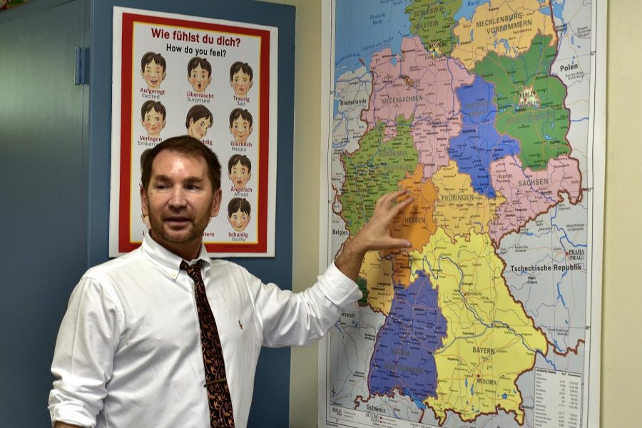 Sergey Artemyev stands in front of a European map to indicate where the German state Hessen is located. Artemyev, who taught at La Habra High School before coming here this school year, looks forward to teaching his students about German culture and promoting the language at Sunny Hills. 