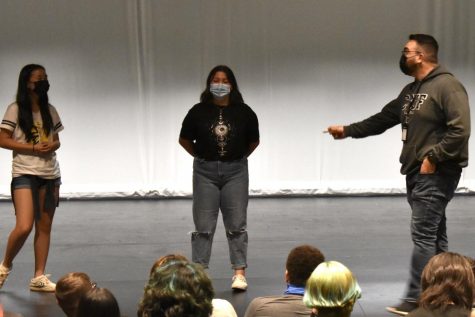 New teacher Christian Penuelas (right) calls up his fifth period theater students, sophomore Isabella Castaneda (middle) and freshman Anabelle Kim (left) for a demonstration of an improvisation performance. All drama levels are in one class period. 