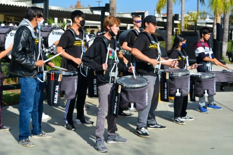 The Lancer Regiment performs a drumline sequence in honor of the various Sunny Hills sports teams in their CIF championship title run on Nov. 5 in the quad.
