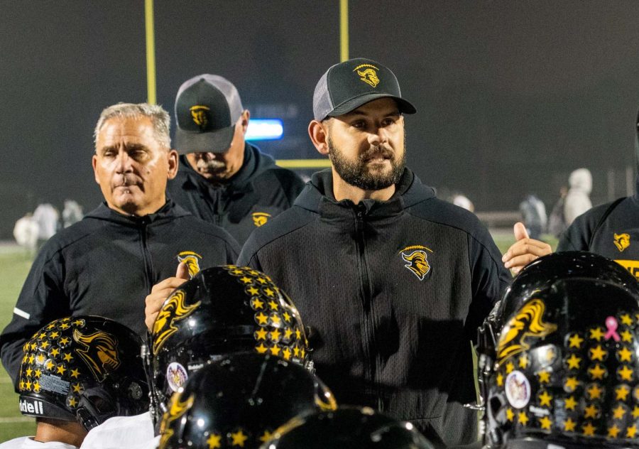 After+a+28-38+loss+against+Newport+Harbor+High+School%2C+head+football+coach+Peter+Karavedas+addresses+his+team+for+the+last+game+of+the+2021+season.