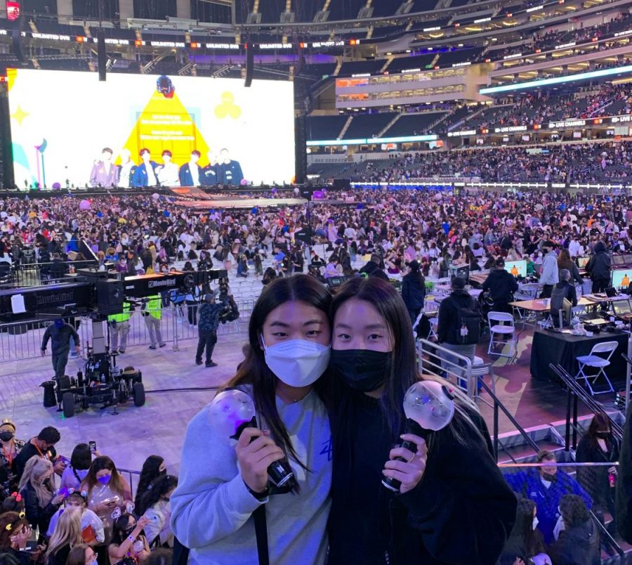 Seniors Esther Oh (left) and Tara Kim (right) attended the first night of the BTS Permission to Dance On Stage show at the SoFi Stadium in Inglewood. For the first time since October 2019, BTS held concerts for fans, performing songs like “Life Goes On,” “Black Swan” and “Dis-ease.” 