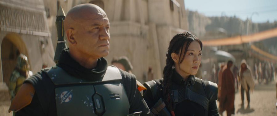 Boba Fett (Temuera Morrison, “Mosley”) and Fennec Shand
(Ming-Na Wen, “Pearl”) step out of a tavern before facing an ambush.