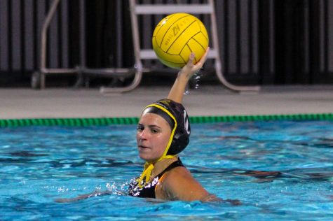 Utility player sophomore Hannah Reekstin looks to pass the ball to her teammate during a Jan. 24 practice at the Sunny Hills pool.