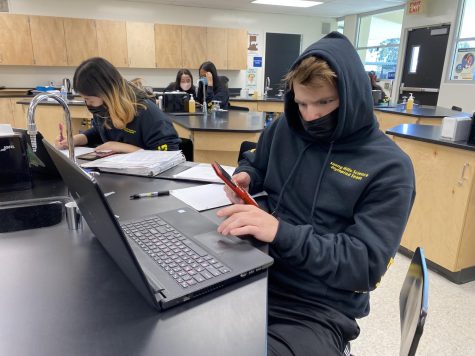 Member junior Thaddaeus Kiker(right) and co-captain Dahee Kim compete in the Detector Building event during the Feb. 26 online satellite Southern California Joint Regional Science Olympiad tournament. The team places sixth overall and will advance to compete at the state level April 2.
