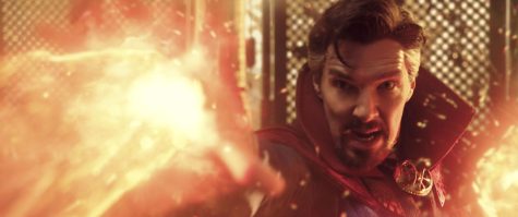 Doctor Strange blasts orange rays in a clash with the Scarlet Witch at the Kamar Taj, the training grounds for mystic art.
