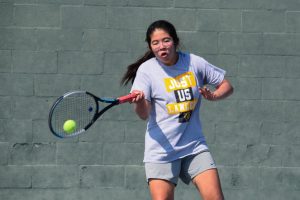 Co-captain senior Veronica Diaz, a top returning player on the girls tennis team this season, gets ready to hit a forehand at a practice on Sept. 6 at Sunny Hills.