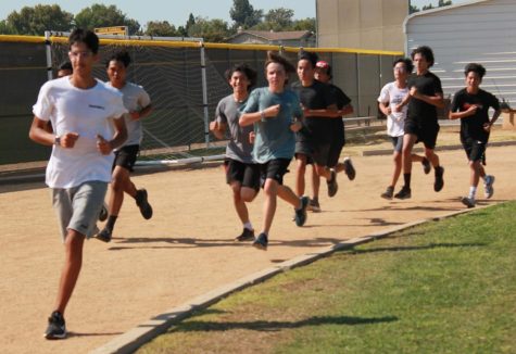 The Sunny Hills boys cross country team practices after school at the track Wednesday, Aug. 24.