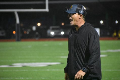 Football head coach David Wilde instructs his players on an offensive play in a Sept. 9 home game against Brea Olinda.