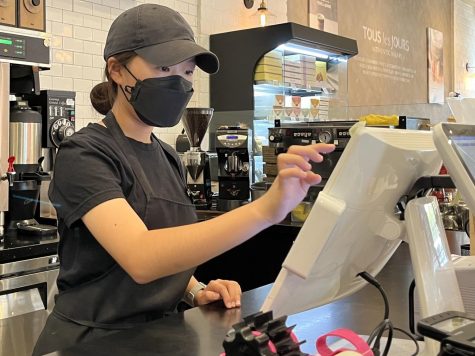 Sophomore Seowon Han works on the point-of-sale system during her Sunday, Sept. 25 morning shift at Tous Les Jours Fullerton.