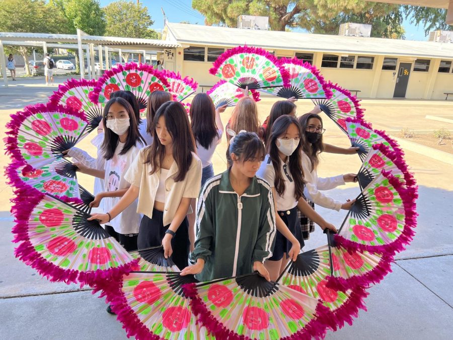 Korean Culture Club's fan dance subgroup practices after school on Wednesday, Sept. 28, for its performance on the Saturday, Oct. 8, Korean Culture Festival that will take place at the Sunny Hills quad.