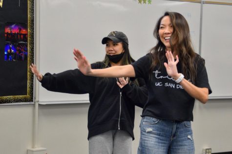Dance 3 member senior Emmaline DeLeon (left) and math teacher Mariam Tan practice their routine on Wednesday, Nov. 16, in Room 130 to prepare for this week’s Dancing With the Staff fundraiser. 