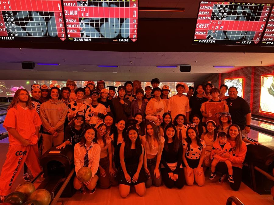 Dance Production and varsity baseball -- some dressed up in Halloween costumes -- celebrate their collaboration during a bowling outing Saturday, Oct. 29, at Bowlero in Fullerton.