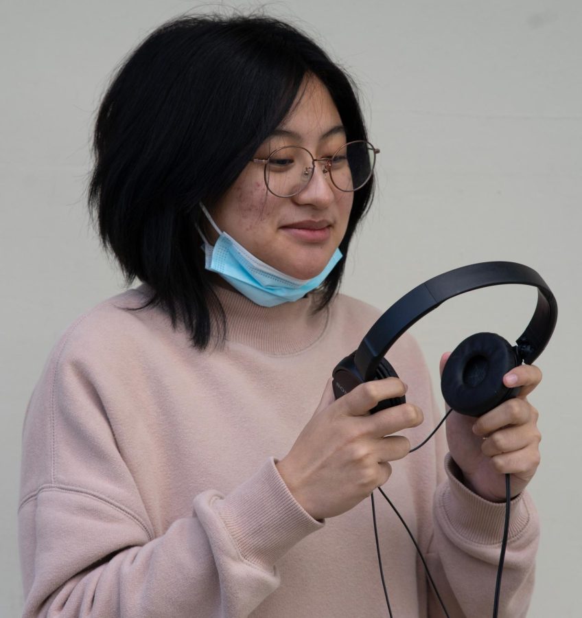 Junior Jerika Tabuada: “If I had a choice between wireless headphones and headphones, I’d probably choose headphones because they are not as easy to lose.” (Photo by Asaph Li)