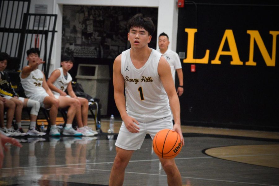 Guard+senior+Johann+Kwon+dribbles+the+basketball+during+a+home+game+against+Western+Christian+High+School+on+Nov.+15%2C+2022.