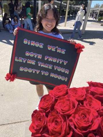 Senior Clarissa Arteaga holds up her homecoming poster on Sept. 23, 2022, after a successful proposal.