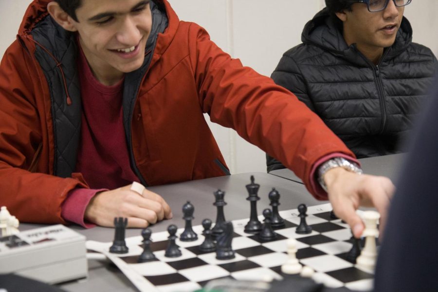Sophomore Anthony Mitri plays chess with another student on Wednesday, March 1, in Room 52 during lunch to hone his skills.